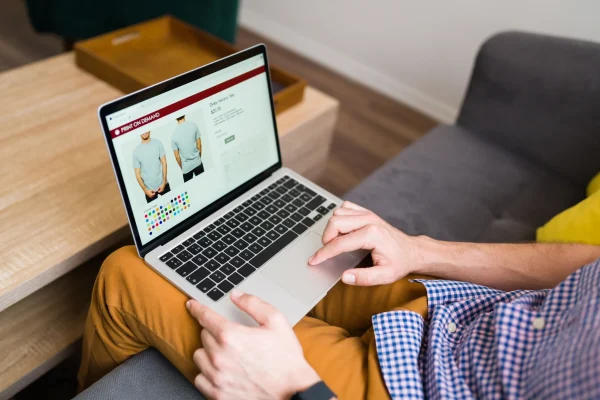 adult-man-doing-online-shopping-leisure-day-home-young-man-buying-clothes-online